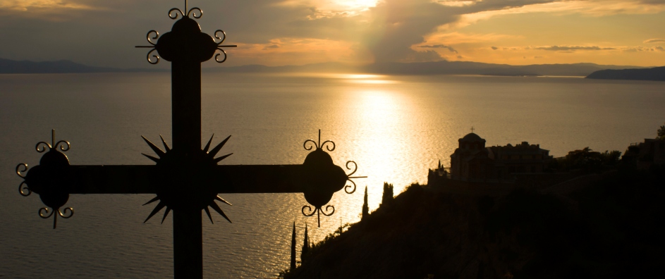 Cross at sunset on Mount Athos, Greece