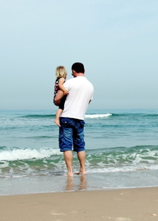 Happy father and his adorable little daughter