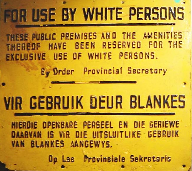 Sign in Afrikaans and English from Apartheid era South Africa.