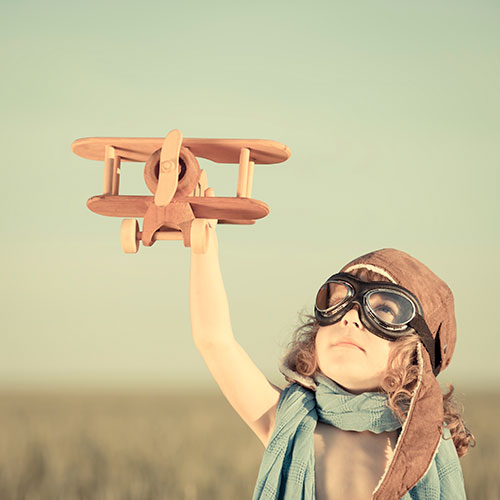 Little girl with airplane