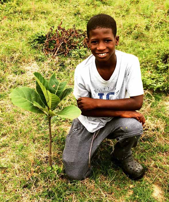 The reforestation project on the Bosque Nativo site brings together community members, both young and old, to reintroduce native vegetation to the area.