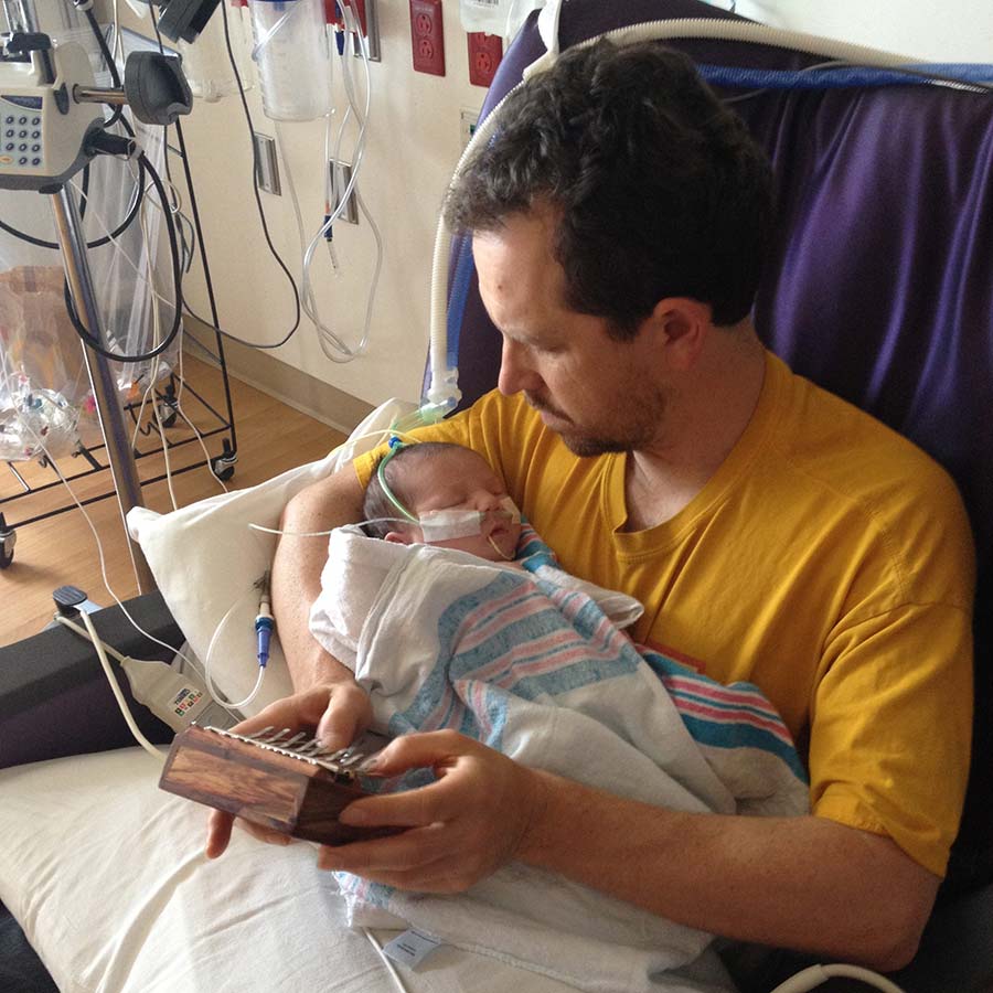 Mark-Stone-and-Newborn-Son-Paxton