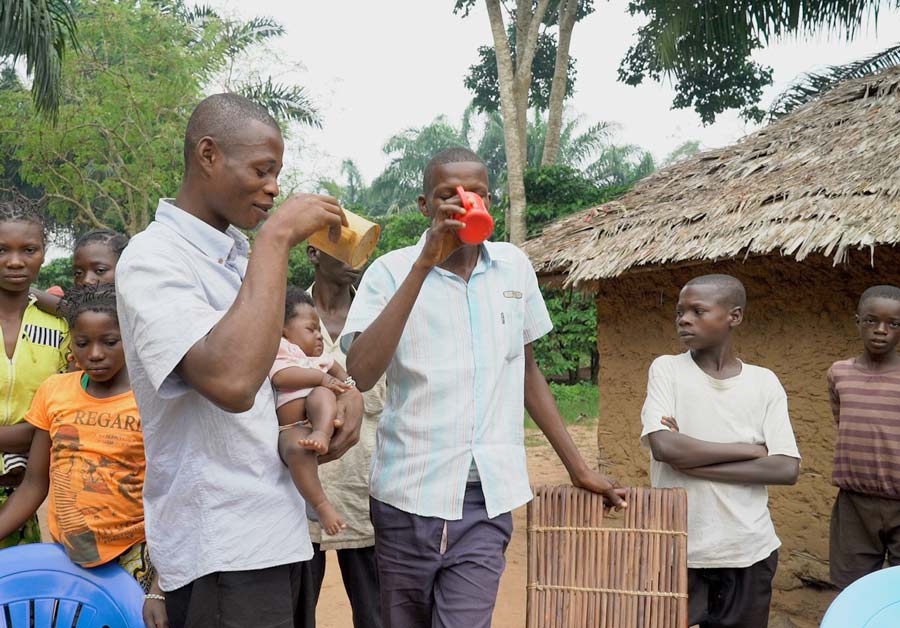 Neighbors enjoy a morning coffee together in Ditalala.