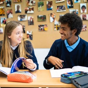 Two students in class at Townshend, a Baha’i inspired International School that emphasizes moral development along with intellectual development.