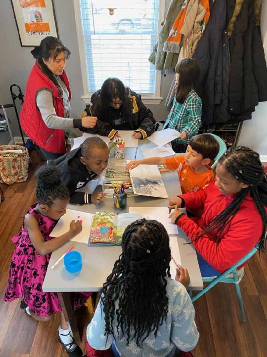 Elaina Barroso and Aaron Ginoza hosting a Baha’i children’s class in their home.