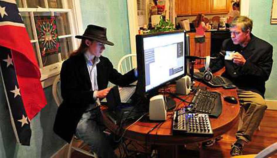 Derek Black and his father Don hosting their radio show in 2008. 