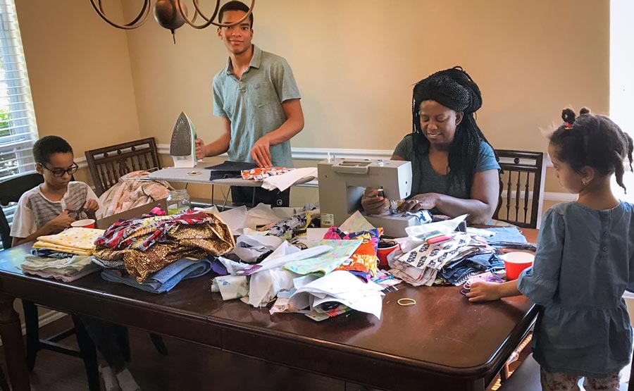 A family in Rockwall, Texas, prepared protective masks for non-medical use and left them for neighbors.