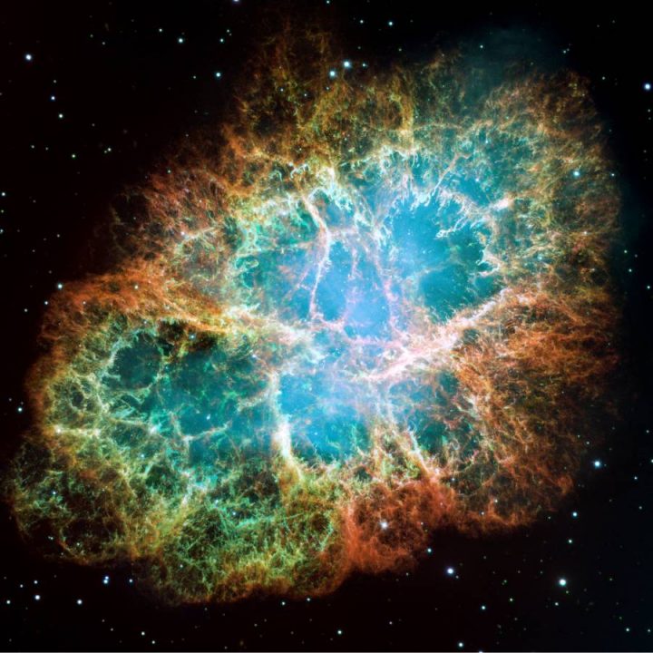 A mosaic image, one of the largest ever taken by NASA’s Hubble Space Telescope, of the Crab Nebula, a six-light-year-wide expanding remnant of a star’s supernova explosion.