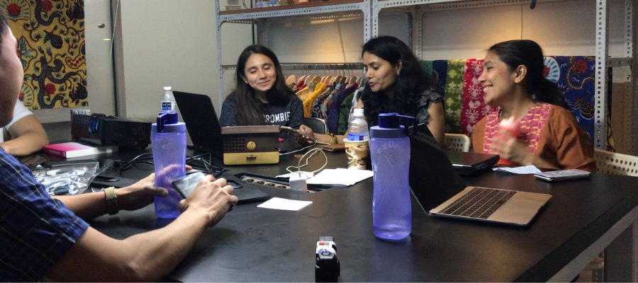 A photo of Angels of Impact volunteers meeting with a social enterprise in Indonesia. Courtesy of Laina Raveendran Greene.