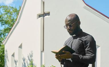 Why Would a Harlem Preacher Visit Africa to Teach the Baha’i Faith?